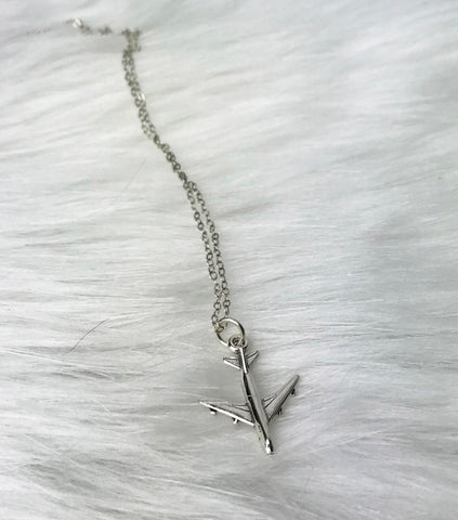 silver airplane necklace