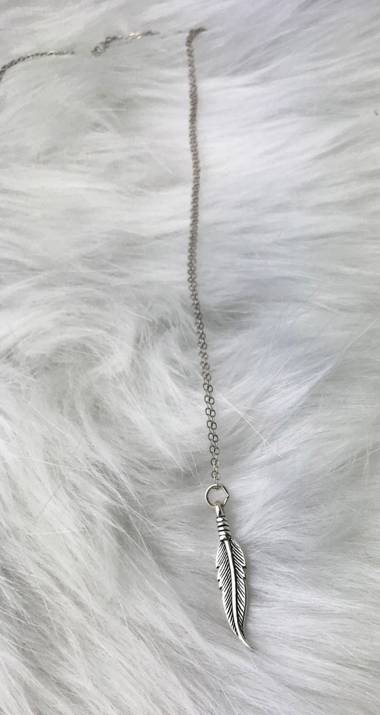 Silver feather necklace meaning outlet