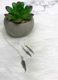 feather earring and necklace