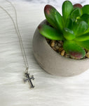 his first cross